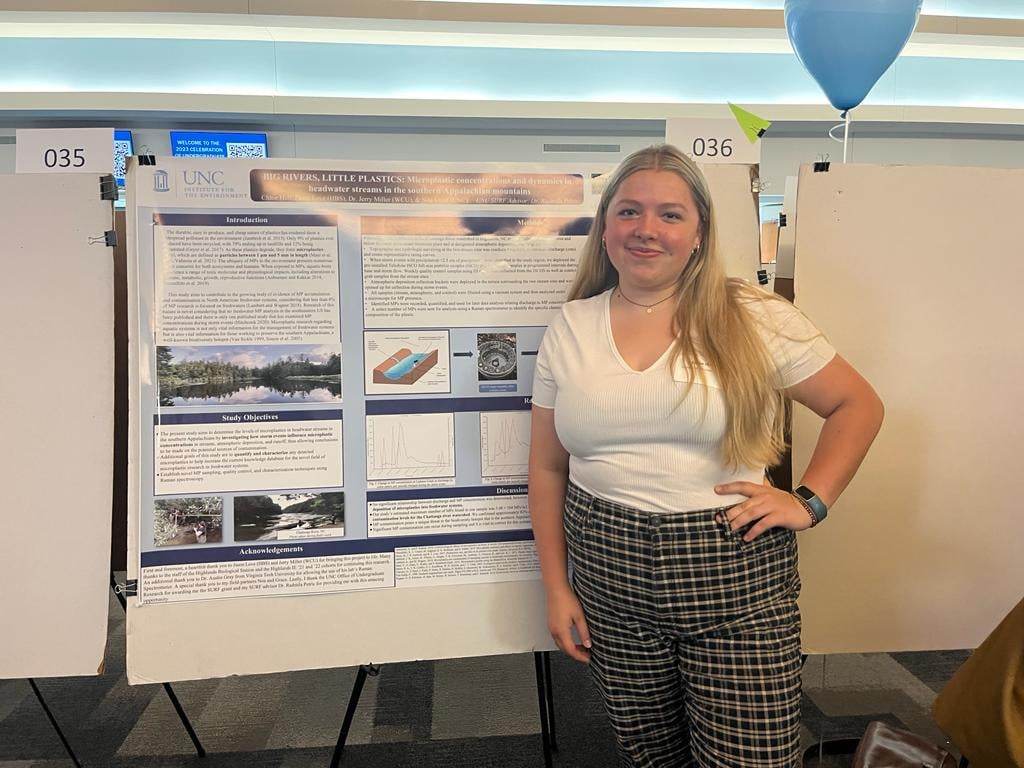 Chloe Hall stands with her top-prize winning poster at the Celebration of Undergraduate Research. Hall earned first-place in Sustainable Carolina’s Excellence in Undergraduate Research competition.