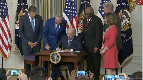 Biden signing law.