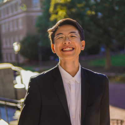 Jason Yan stands outside on the UNC Chapel Hill campus